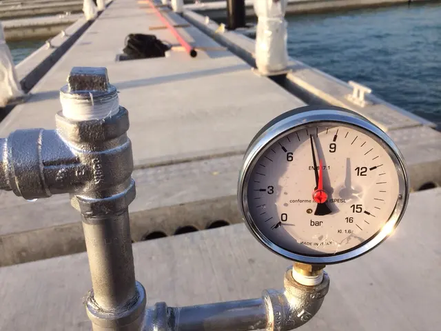 Pressure gauge on stainless pipework at a Kuwait marina jetty