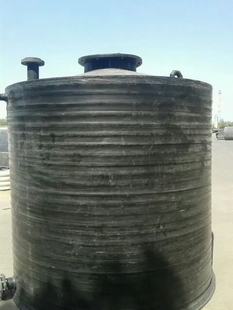 Large HDPE storage tank with flanged top nozzles on a Kuwait site
